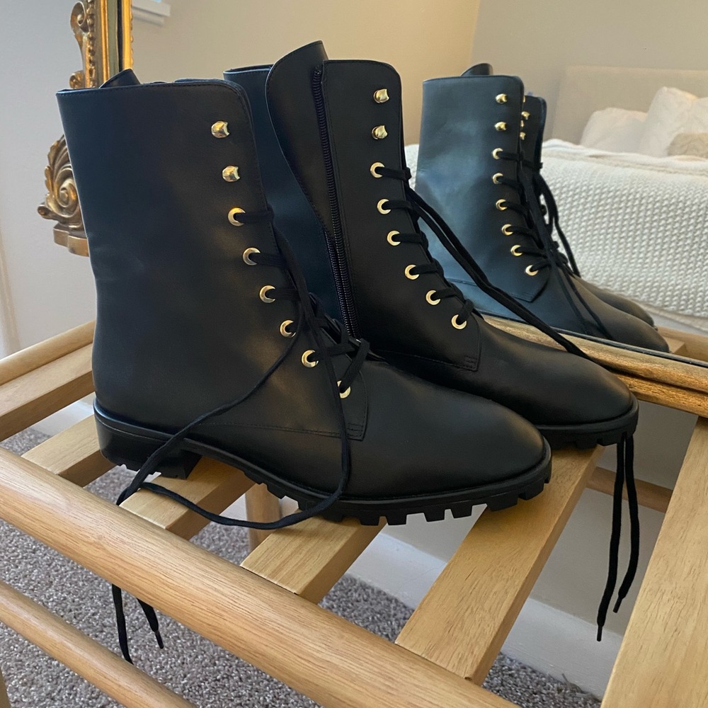 Stuart Weitzman Mila lift black lace up leather boots.